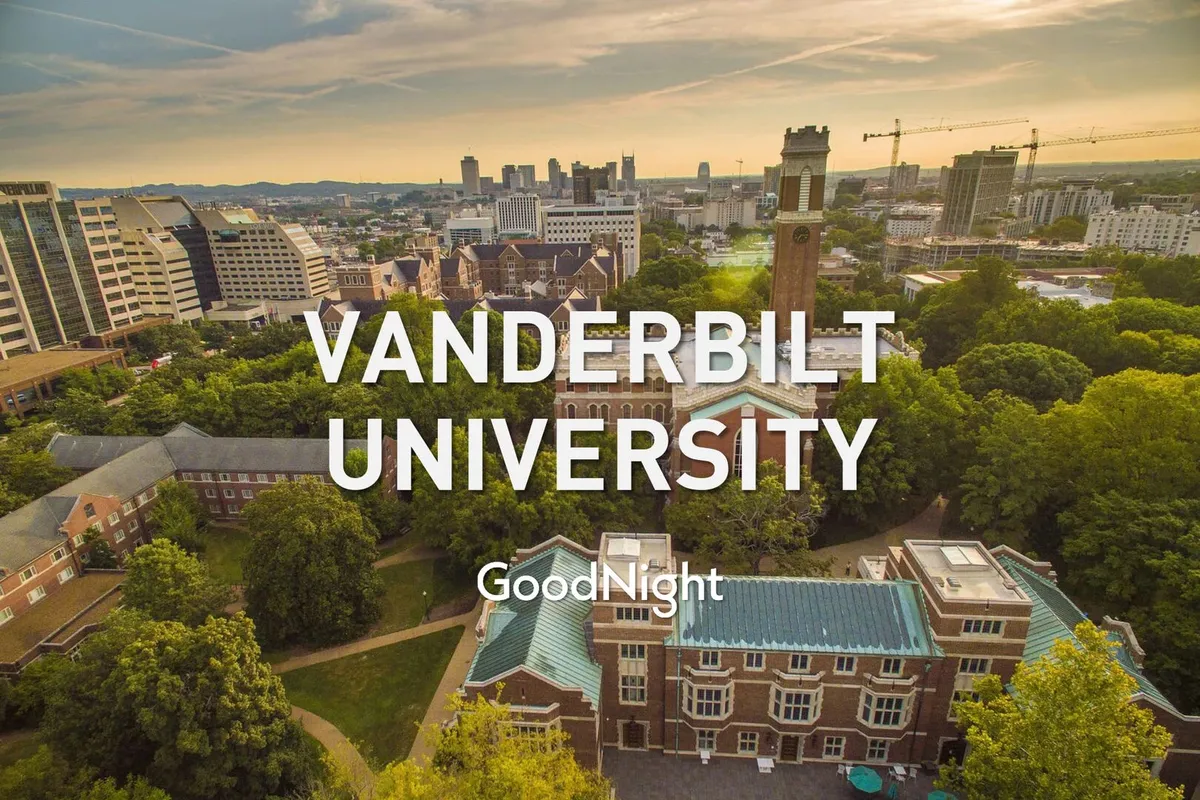 A scenic perspective of Vanderbilt University, highlighted by its signature clock tower, city skyline backdrop, and lush greenery. The view exudes a sense of prestige and tranquility, capturing the neighborhood's academic and professional appeal.